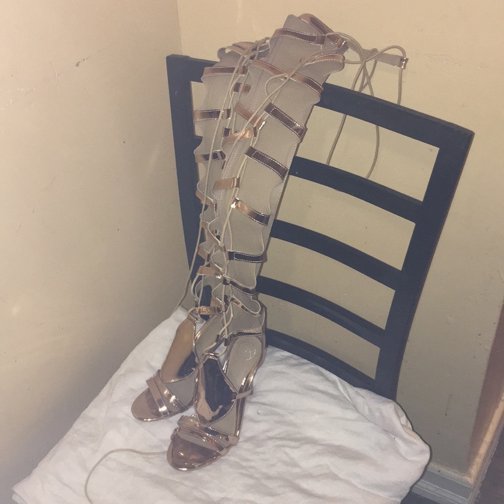 Knee high lace up heels